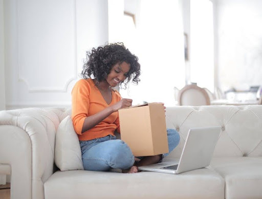 unnamed - My MMA News A Canadian shopper completing an online order at a home desk
