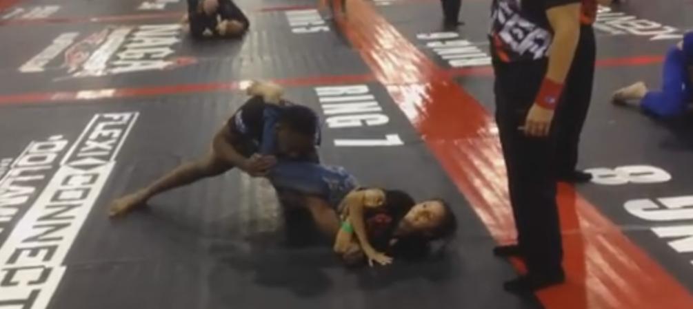 VIDEO: Jon Jones submitted by young girl at NAGA event