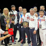 Team Russia celebrates its victory with (center) Fedor Emelianenko