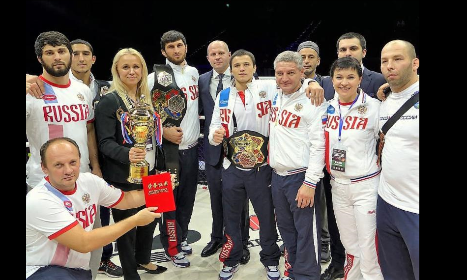 Team Russia celebrates its victory with (center) Fedor Emelianenko