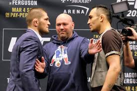 Tony Ferguson (right) stares down Khabib Nurmagomedov