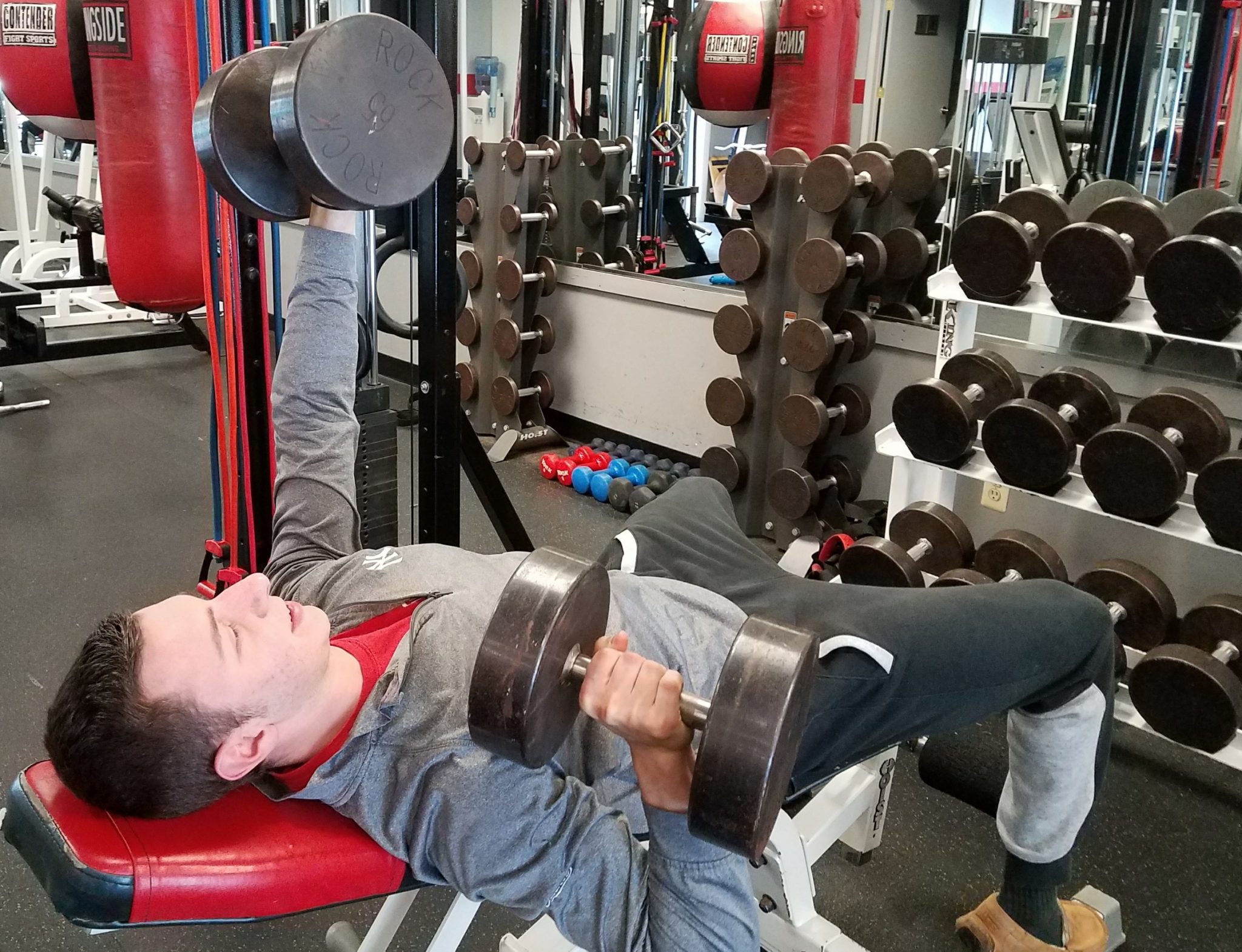 Nick doing alternating 1 Arm incline presses