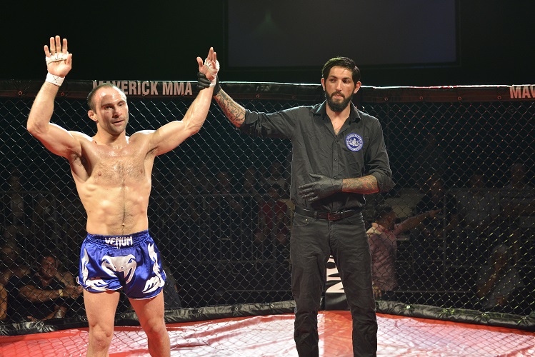 Thad Frick victorious at Maverick MMA 2. Photo by William McKee