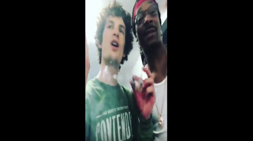 Snoop Dogg, Sean O'Malley smoking a blunt with Snoop Dogg