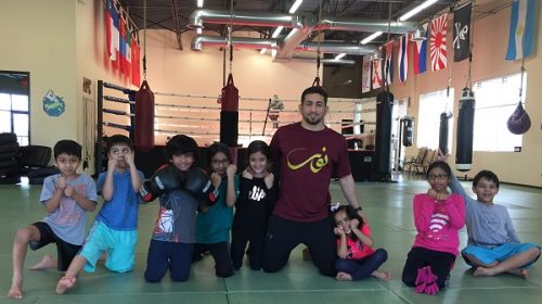 Abdul Kareem Al-Selwady trains children as he prepares for BRAVE 10