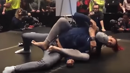 VIDEO: Cyborg rolls with masked man, revealed to be BJ Penn