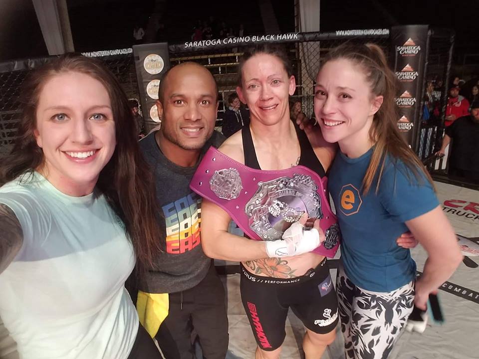 Cheri Muraski with (left to right) Teammate Claire Guthrie, Coach Vellore Caballero and Teammate Veronica Graves