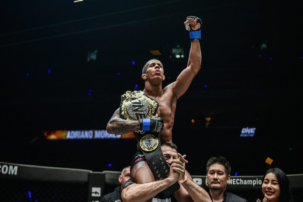 Adriano Moraes upsets Geje Eustaquio to capture ONE flyweight world championship