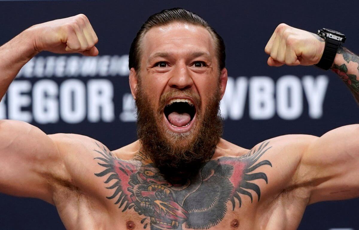 Conor McGregor officially signs to fight Dustin Poirier at UFC 257 in