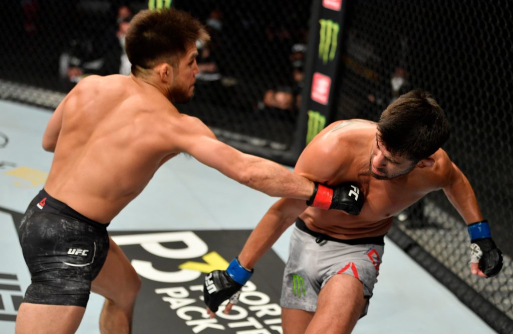 Henry Cejudo retires as champion, finishes Dominick Cruz in the second round