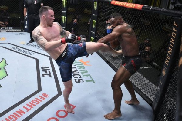 Colby Covington dominates Tyron Woodley, fight stopped in 5th round due to injury, UFC Vegas 11