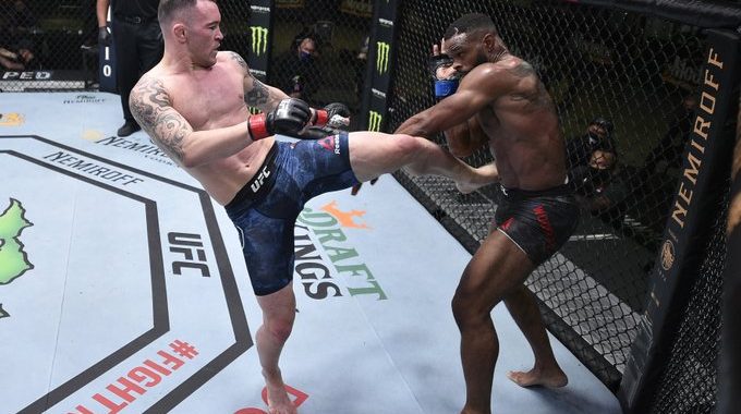 Colby Covington dominates Tyron Woodley, fight stopped in 5th round due to injury, UFC Vegas 11