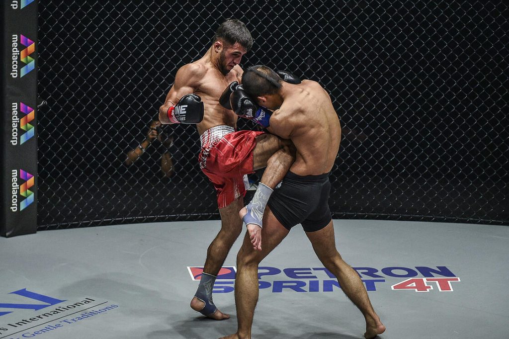 Aslanbek Zikreev Takes Close Split Decision Victory Over Wang Junguang