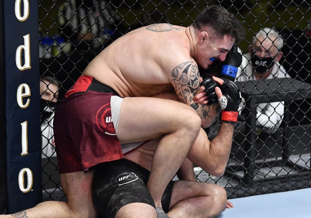 Tom Aspinall submits Andrei Arlovski in round two to retain one hundred percent finishing rate