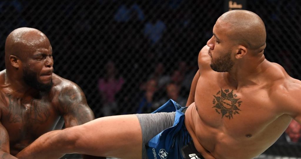 Ciryl Gane stops Derrick Lewis in round three, claims interim HW title at UFC 265