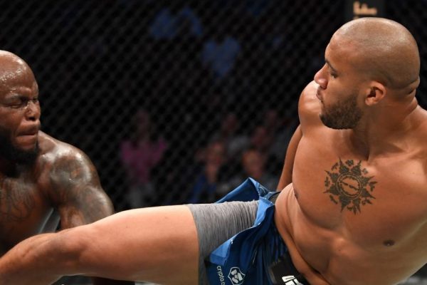 Ciryl Gane stops Derrick Lewis in round three, claims interim HW title at UFC 265