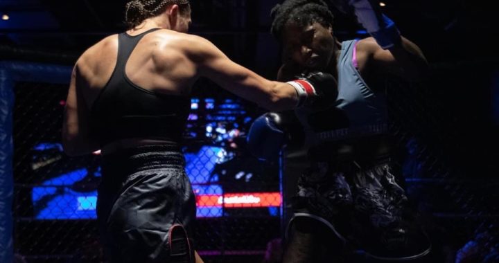 Mia Inzirilo connects with a right hand to the chin of Sharneka Wright. (Photo captured by Peter Scifo)