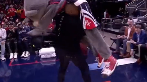 Daniel Cormier body-slams Houston Rockets mascot