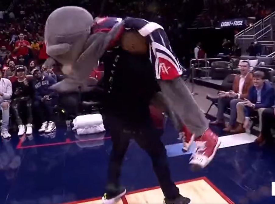 Daniel Cormier body-slams Houston Rockets mascot