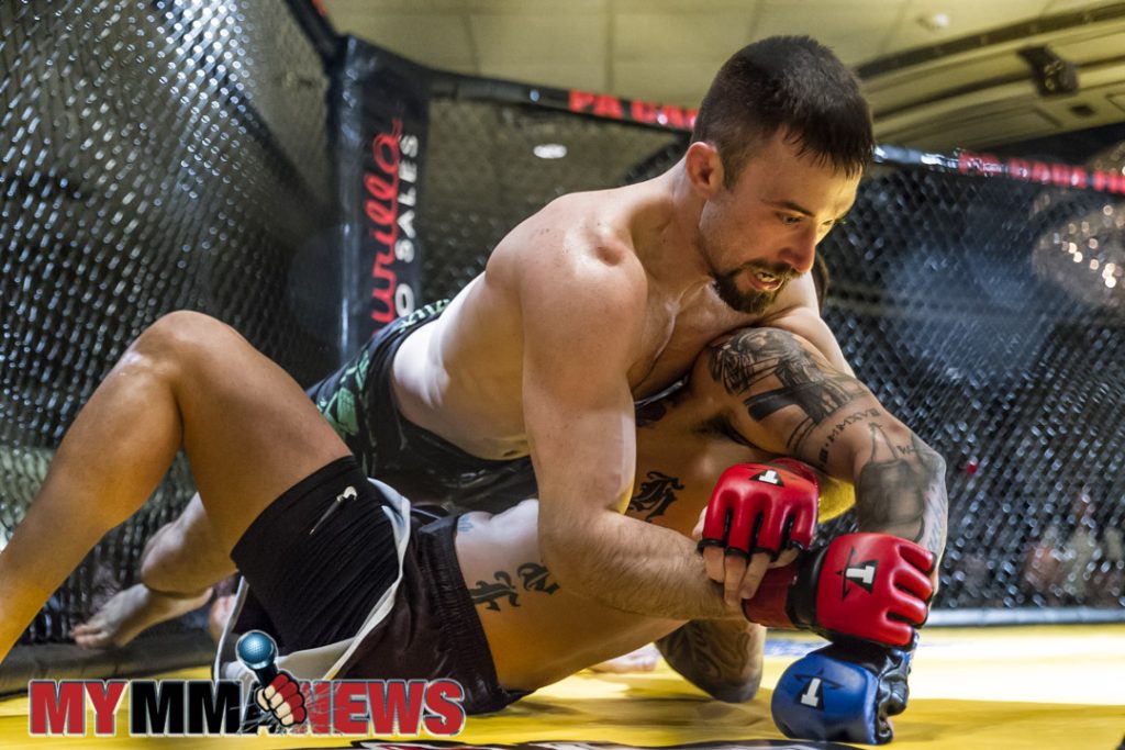 Jim Fitzpatrick working for a submission at PA Cage Fight 35- Photo by William McKee for MyMMANews