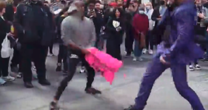 Times Square Pillow Fight - The Joker does battle with Marcus Brimage