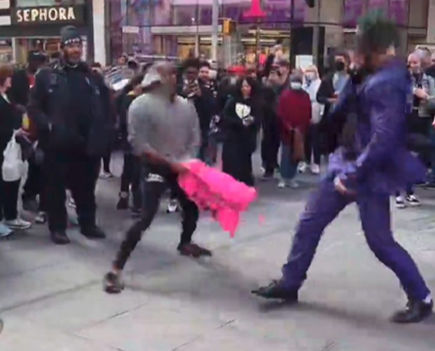 Times Square Pillow Fight - The Joker does battle with Marcus Brimage
