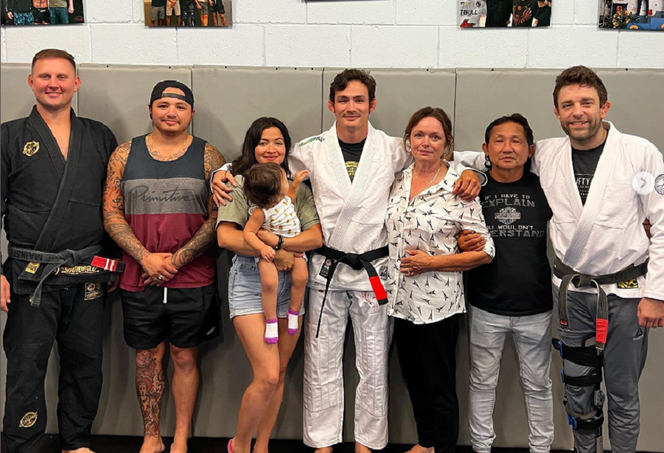 Thanh Le receives black belt from Ryan Hall