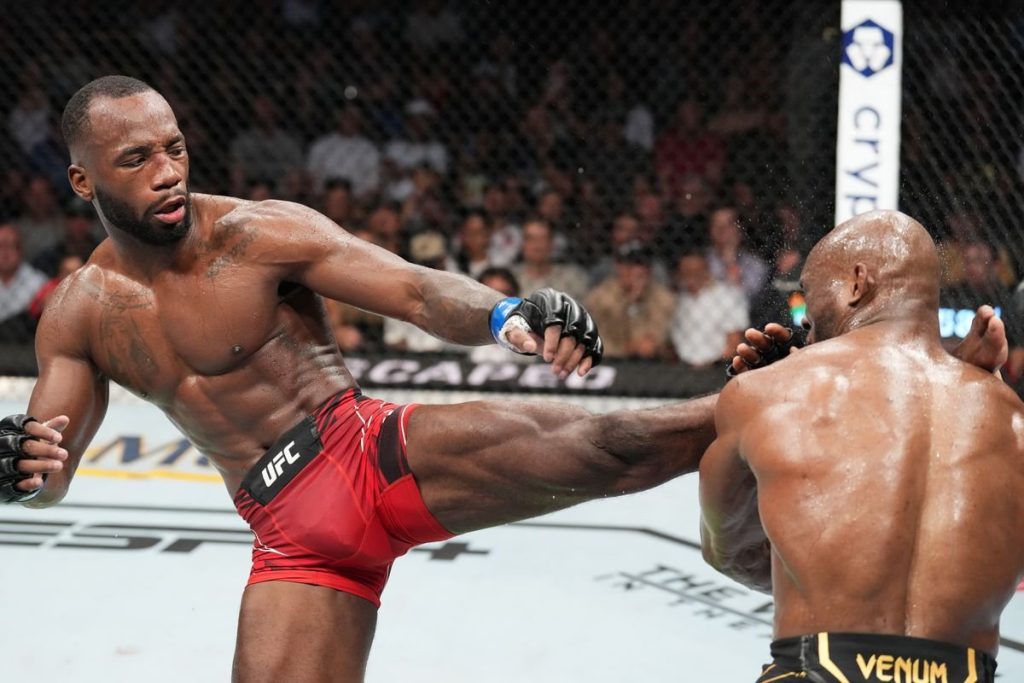 Leon Edwards rallies to KO Kamaru Usman in last minute of 5th round to claim title at UFC 278