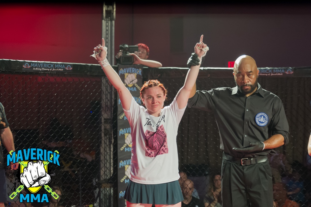 Marissa Heckman victorious at Maverick 19 - Photo by William McKee for Maverick MMA