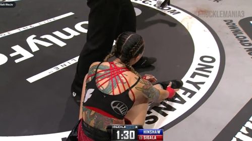 Charisa Sigala resets her leg after injury at KnuckleMania 3