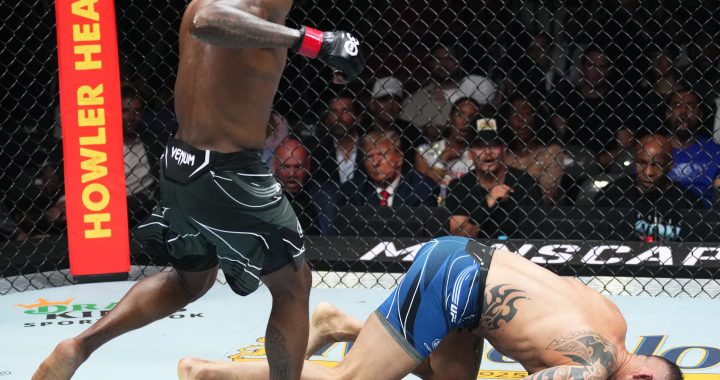 Kevin Holland flattens Santiago Ponzinibbio with nasty left hook at UFC 287