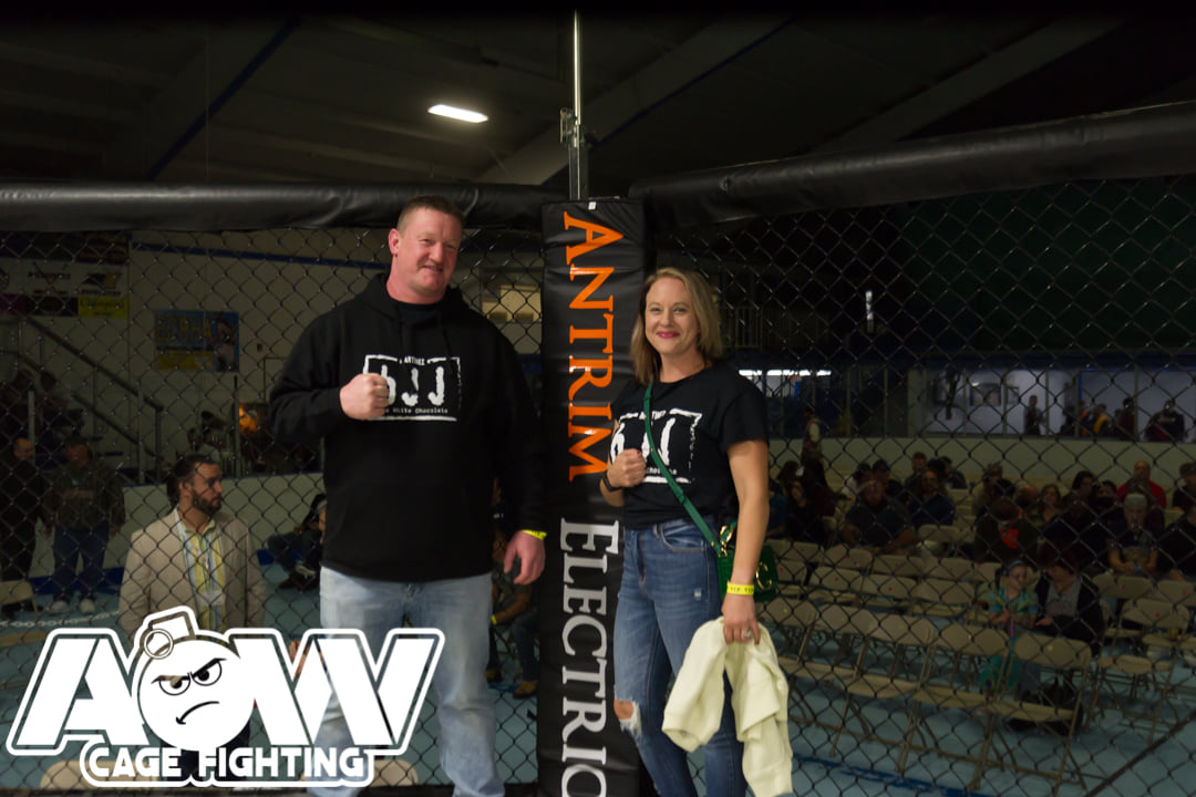 Greg McErlain and Nadia Bilynsky (Antrim Electric owners) at Art of War Cage Fighting - Photo by William McKee for AOW