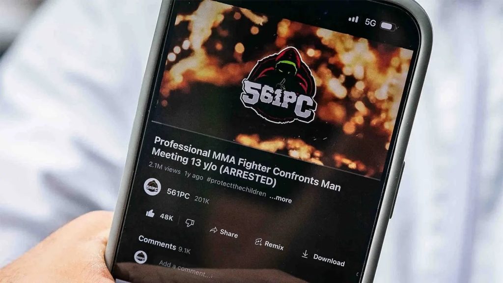 Phone screen showing a YouTube video titled 'Professional MMA Fighter Confronts Man Meeting 13 y/o (ARRESTED)' with 2.1M views and the channel 561PC, on a dark thumbnail backdrop.